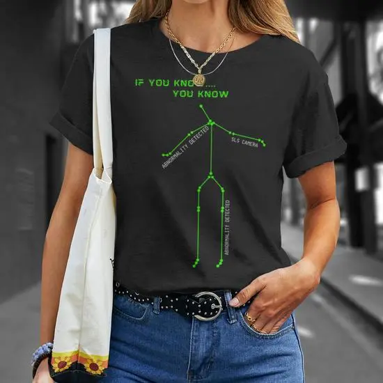 The Stick Man Knows Paranormal Tee  (Small)